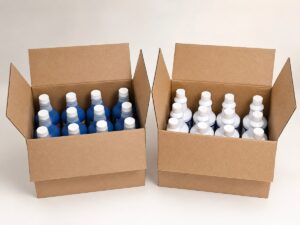 Two open cases containing twelve blue ROG3 bottles and twelve white ROG1 bottles